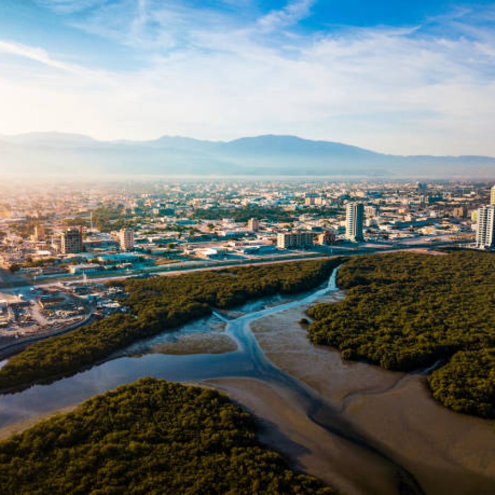 Aerial view of Ras al Khaimah over the mangroves and the creek in the United Arab Emirates at sunrise